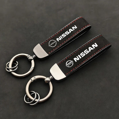Nissan Suede Keychain — Sport Emblem, Zinc Alloy Hardware, Premium Finish