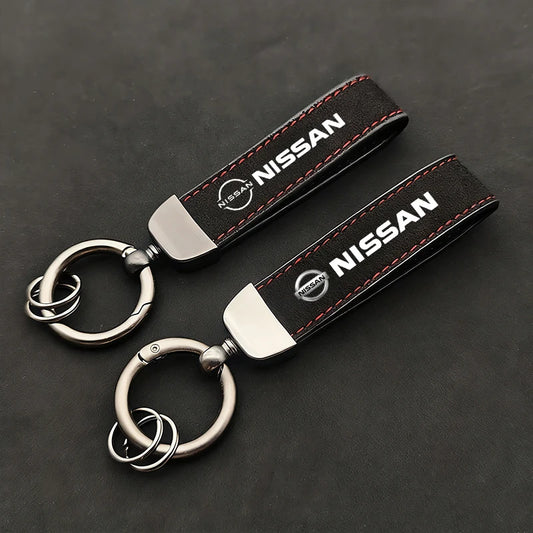 Nissan Suede Keychain — Sport Emblem, Zinc Alloy Hardware, Premium Finish