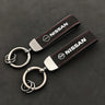 Nissan Suede Keychain — Sport Emblem, Zinc Alloy Hardware, Premium Finish