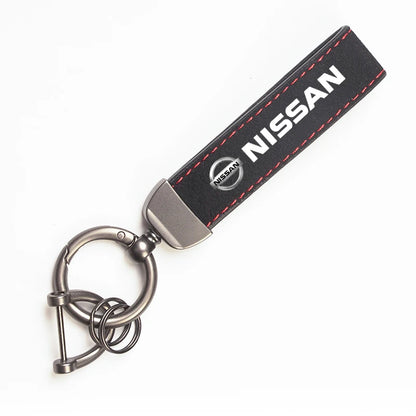 Nissan Suede Keychain — Sport Emblem, Zinc Alloy Hardware, Premium Finish