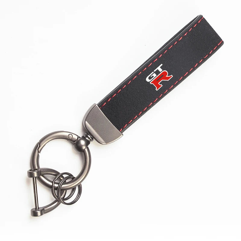 Nissan Suede Keychain — Sport Emblem, Zinc Alloy Hardware, Premium Finish