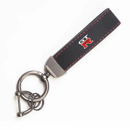 Nissan Suede Keychain — Sport Emblem, Zinc Alloy Hardware, Premium Finish