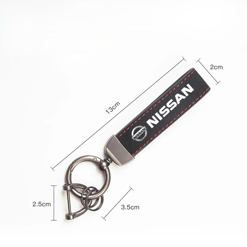 Nissan Suede Keychain — Sport Emblem, Zinc Alloy Hardware, Premium Finish
