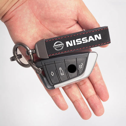 Nissan Suede Keychain — Sport Emblem, Zinc Alloy Hardware, Premium Finish